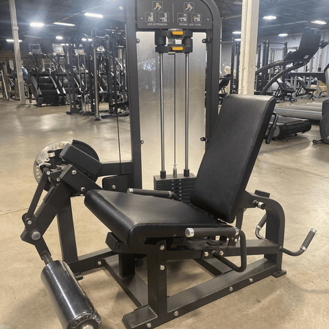 The Plate Loaded Leg Extension/ Leg Curl Combo! . This machine offers a  smooth & easy transition from a Leg Extension machine to a Prone/